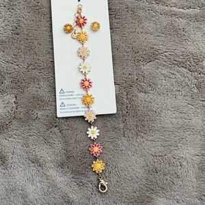 🚨3 for $15🚨 Set of Flower Earrings and Charm Bracelet.